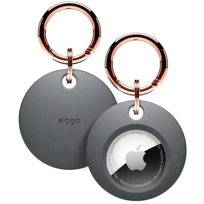 Szare etui do Apple AirTag z metalowym kółkiem do kluczy, akcesorium biurowe.