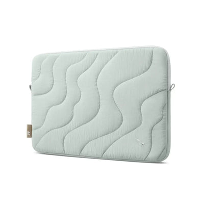 Jasnoszara pikowana torba na laptopa, minimalistyczny design, akcesoria biurowe