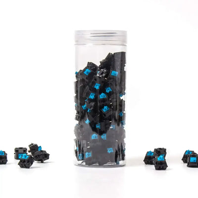 Zestaw niebieskich switchy Cherry Blue do klawiatury mechanicznej w przezroczystym pojemniku