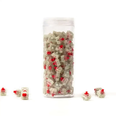 Przełączniki mechaniczne Cherry RGB Red do klawiatur w przezroczystym pojemniku na białym tle