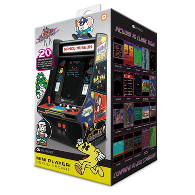 Opakowanie retro konsoli mini arcade Namco Museum z 20 klasycznymi grami, widoczne kolorowe grafiki gier.