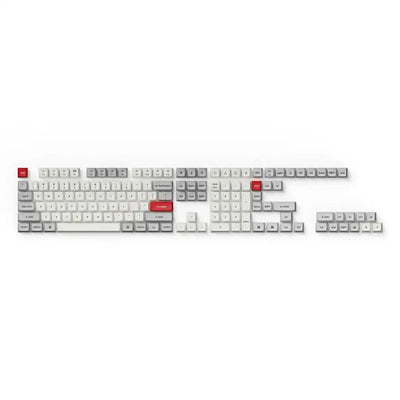 Zestaw keycapów PBT do klawiatury mechanicznej, jasnoszare i białe z czerwonymi akcentami.