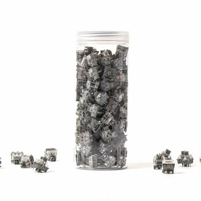 Przezroczyste switche Kailh Midnight Pro Silent Tactile do klawiatur mechanicznych w pojemniku