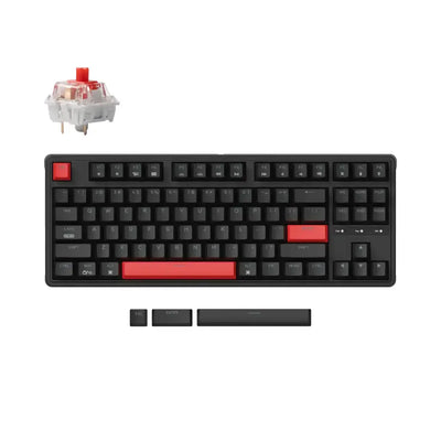 Czarna klawiatura mechaniczna TKL z czerwonymi keycapami i czerwonym switchem, układ 80%.