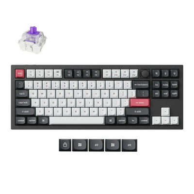 Klawiatura mechaniczna QMK, czarna, klawisze w odcieniach szarości, różowy Enter, dodatkowe keycapy i switch.