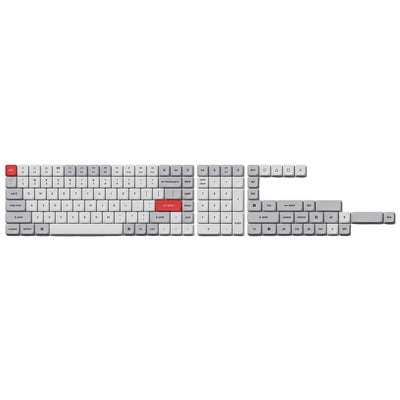 Zestaw keycapów PBT LSA w kolorach jasnoszary i biały, z czerwonymi klawiszami akcentującymi, do klawiatury mechanicznej.