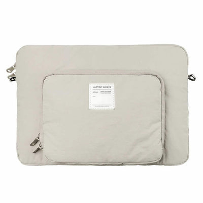 Szara torba na laptopa z dużą kieszenią na akcesoria, minimalistyczny design.