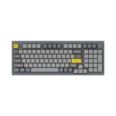 Szara klawiatura mechaniczna z żółtymi klawiszami esc i enter, idealna do biura.