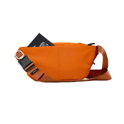 Pomarańczowa torba na ramię Urban Sling, regulowany pasek, kieszeń z książką