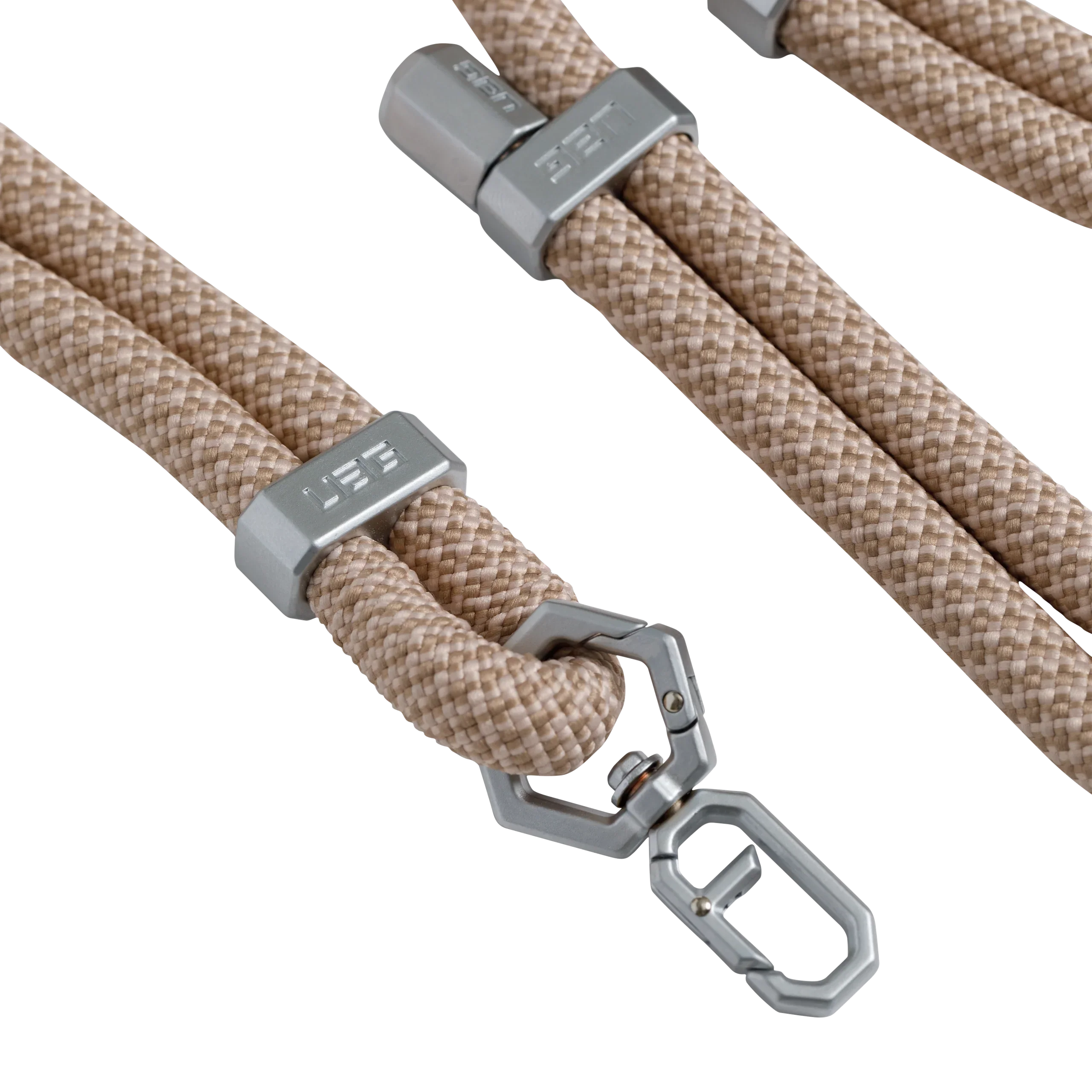 Beżowy, pleciony kabel z metalowymi złączami i karabinkiem do organizacji kabli w Home Office