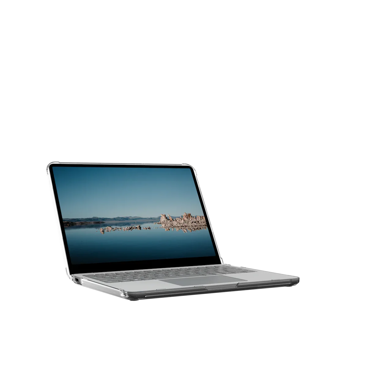 Laptop w przezroczystym etui, idealny do Home Office i desk setupu, z ekranem pokazującym krajobraz