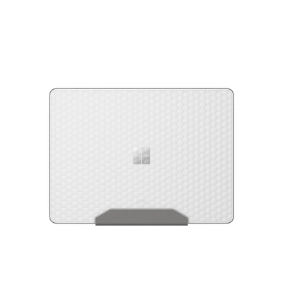 Biała mata pod laptopa z geometrycznym wzorem i podstawką, idealna do home office