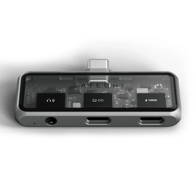 Przejściówka USB-C z przezroczystą obudową, portami audio i dwoma portami USB-C