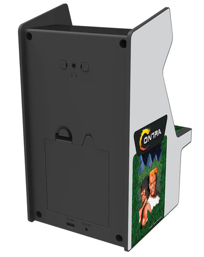 Tył konsoli retro arcade Contra, porty ładowania, kolorowa grafika z postaciami z gry.