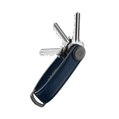 Ciemnogranatowy organizer na klucze z eleganckim przeszyciem, metalowe klucze w etui