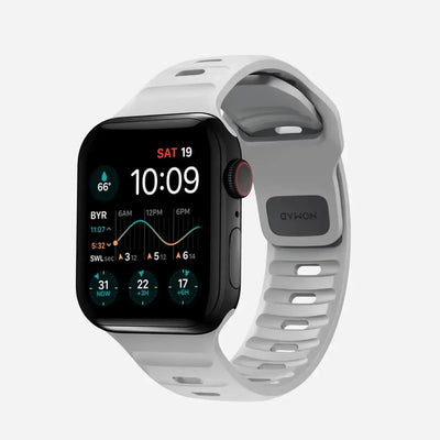 Nowoczesny smartwatch z czarnym ekranem dotykowym i białym sportowym paskiem