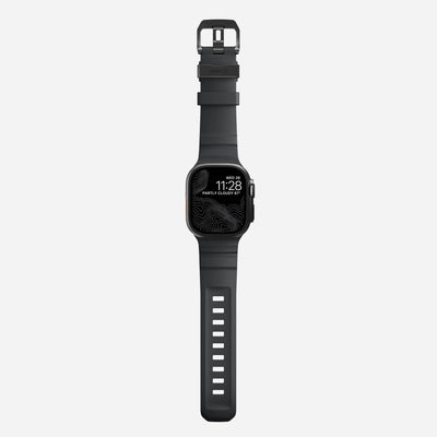 Czarny silikonowy pasek do Apple Watch 49mm na jasnym tle, widok z przodu