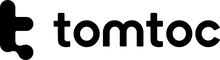 czarno-białe logo tomtoc, minimalistyczny motyw geometryczny, akcesoria biurowe