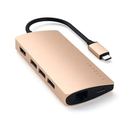 Złoty adapter USB-C multiport z portami HDMI, USB, Ethernet i USB-C do biura