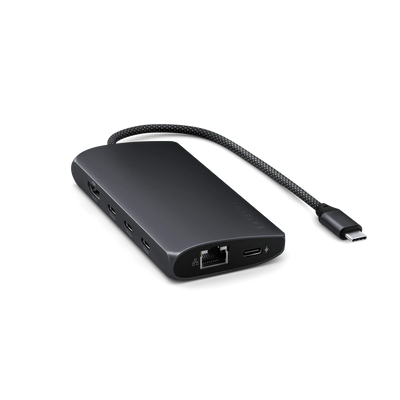 Adapter USB-C multiport 8K z portem Ethernet na czarnym tle, akcesorium biurowe